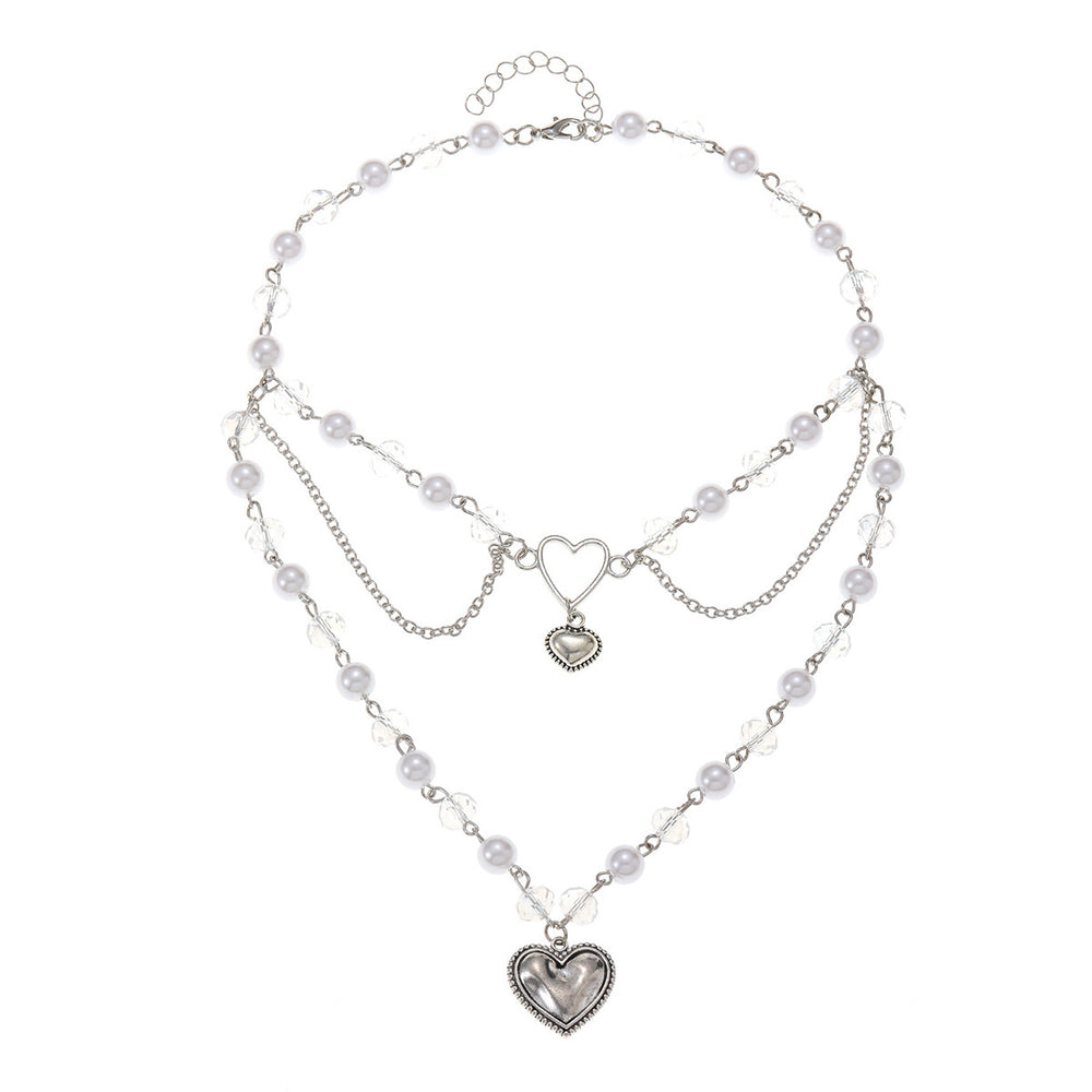 Wholesale faux pearl chains: cross-border fashion, niche, high-end, gothic style heart pendant necklace, sweater chain accessories