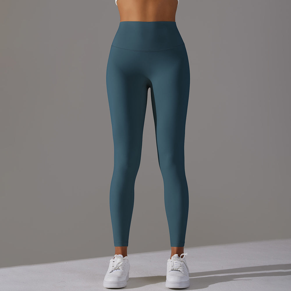 High-waisted, barely-there yoga pants for women, designed with a no-ride-up waistband for a seamless look. these figure-hugging, peach-shaped leggings offer a lift and a comfortable, stretchy fit, perfect for workouts and fitness activities. custom manufa