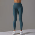 High-waisted, barely-there yoga pants for women, designed with a no-ride-up waistband for a seamless look. these figure-hugging, peach-shaped leggings offer a lift and a comfortable, stretchy fit, perfect for workouts and fitness activities. custom manufa