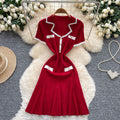 French chic chanel-inspired color block knit dress with peter pan collar, metal buckle waist, and slimming fit