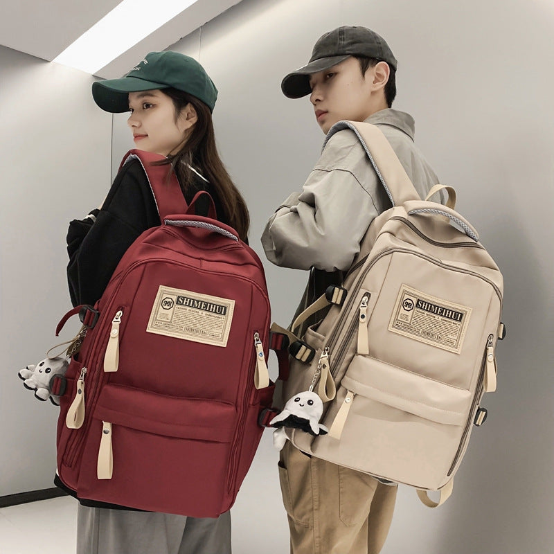 Spring and summer simple travel backpack computer backpack casual solid color ultra-light junior high school students large-capacity schoolbag