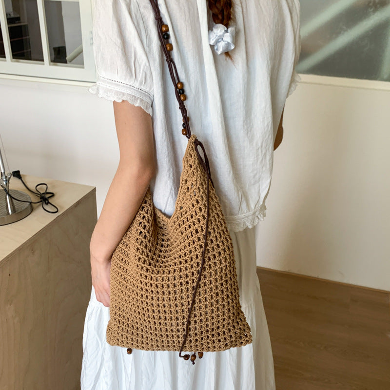 Cross-border niche design mesh bag hollow woven tote bag shoulder messenger bag 2025 new leisure style beach bag