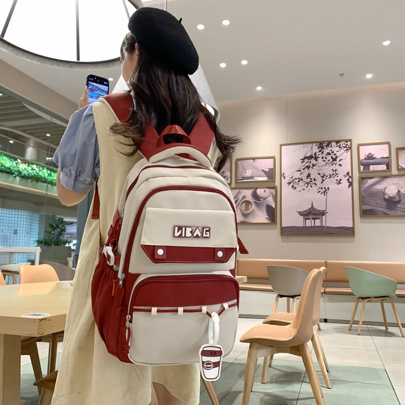 New large-capacity schoolbag male junior high school students contrasting color double backpack Korean version college student couple fashion backpack