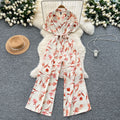 Summer outfit: women's vacation-ready fashion - collared short sleeve tie-waist casual printed wide-leg jumpsuit/pants
