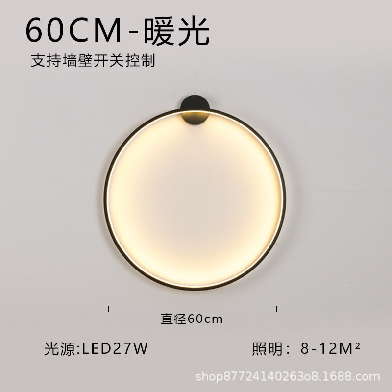 Minimalist chic large round wall sconce - stylish ambient lighting for living room backdrops, bedroom headboards, and more