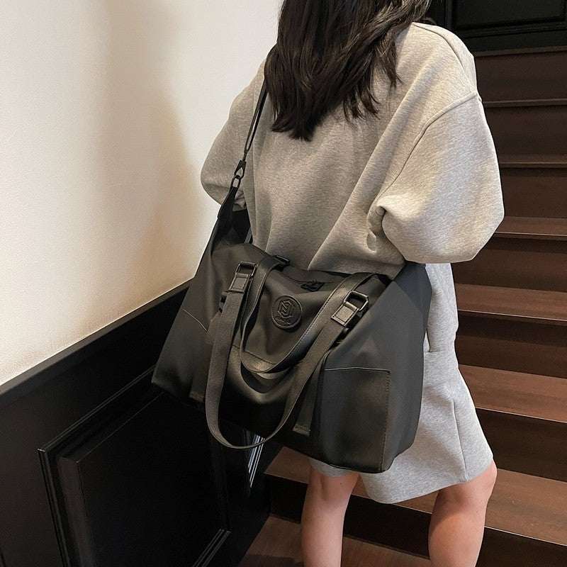 Cross-border fashion large-capacity travel bags, light travel, hand luggage bags, outdoor camping storage, messenger bags wholesale