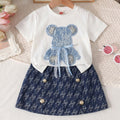spring/summer new arrival: cross-border girls' knitted top with bear appliqué + denim skort two-piece set