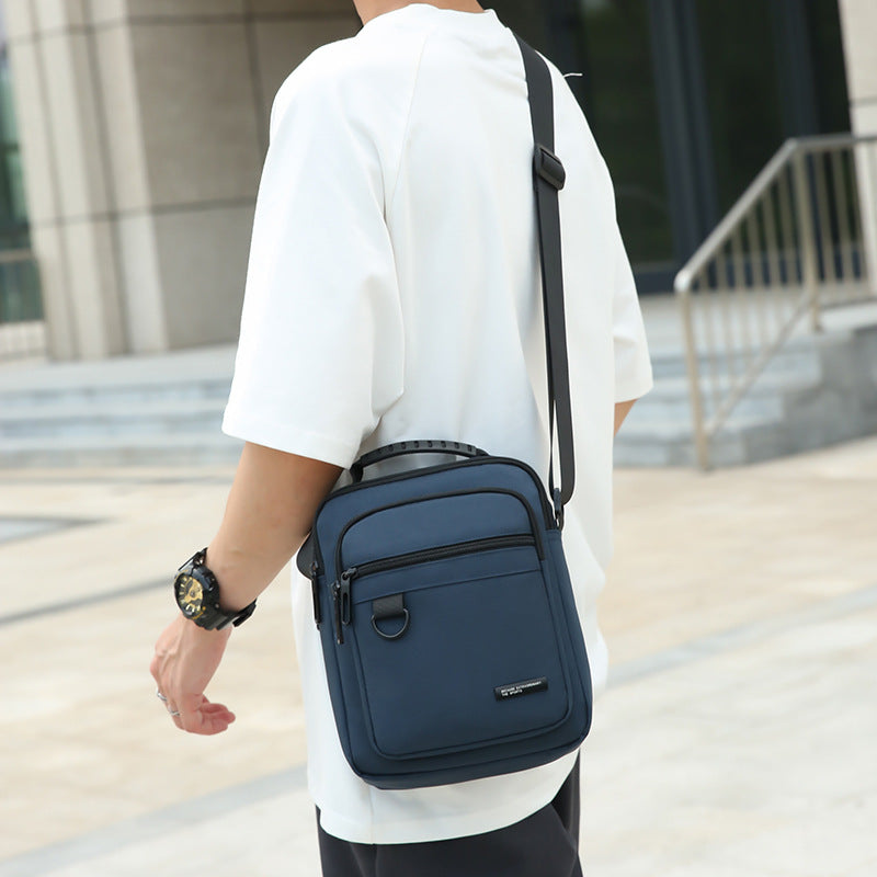 Men's bag 2024 new large-capacity multi-compartment shoulder bag business commute simple messenger bag fashion bag wholesale
