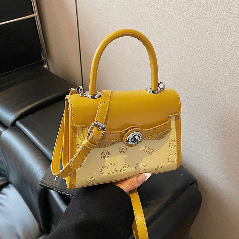 Simple contrasting color small bag women's 2025 summer new portable small square bag advanced super fire niche texture messenger bag