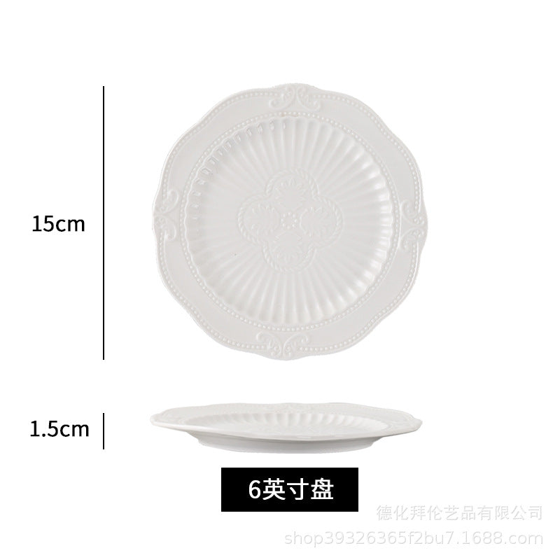 European-style pure white dessert plate, three-tier fruit platter, modern showroom display, creative embossed ceramic plate wholesale
