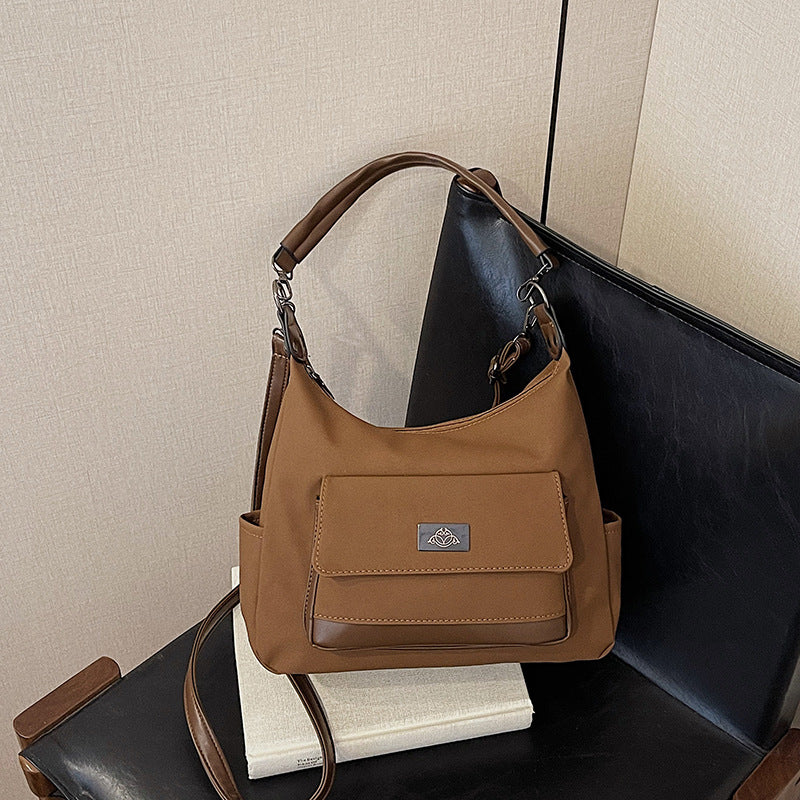 Foreign trade popular women's bags retro large-capacity shoulder messenger bags European and American mail carrier underarm simple casual mail carrier bags