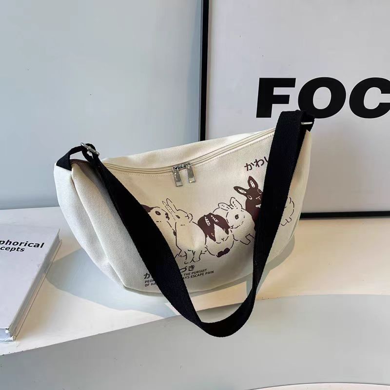 Niche style canvas bag for women 2024 spring and summer new arrivalcasual large capacity student shoulder work clothing bag crossbody dumpling bag