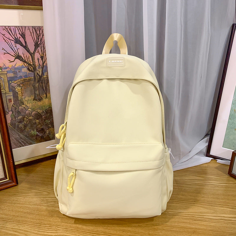 Japanese-inspired, effortlessly chic backpack. new, sweet, solid-color design for elementary school students. a fresh, versatile, lightweight backpack perfect for school