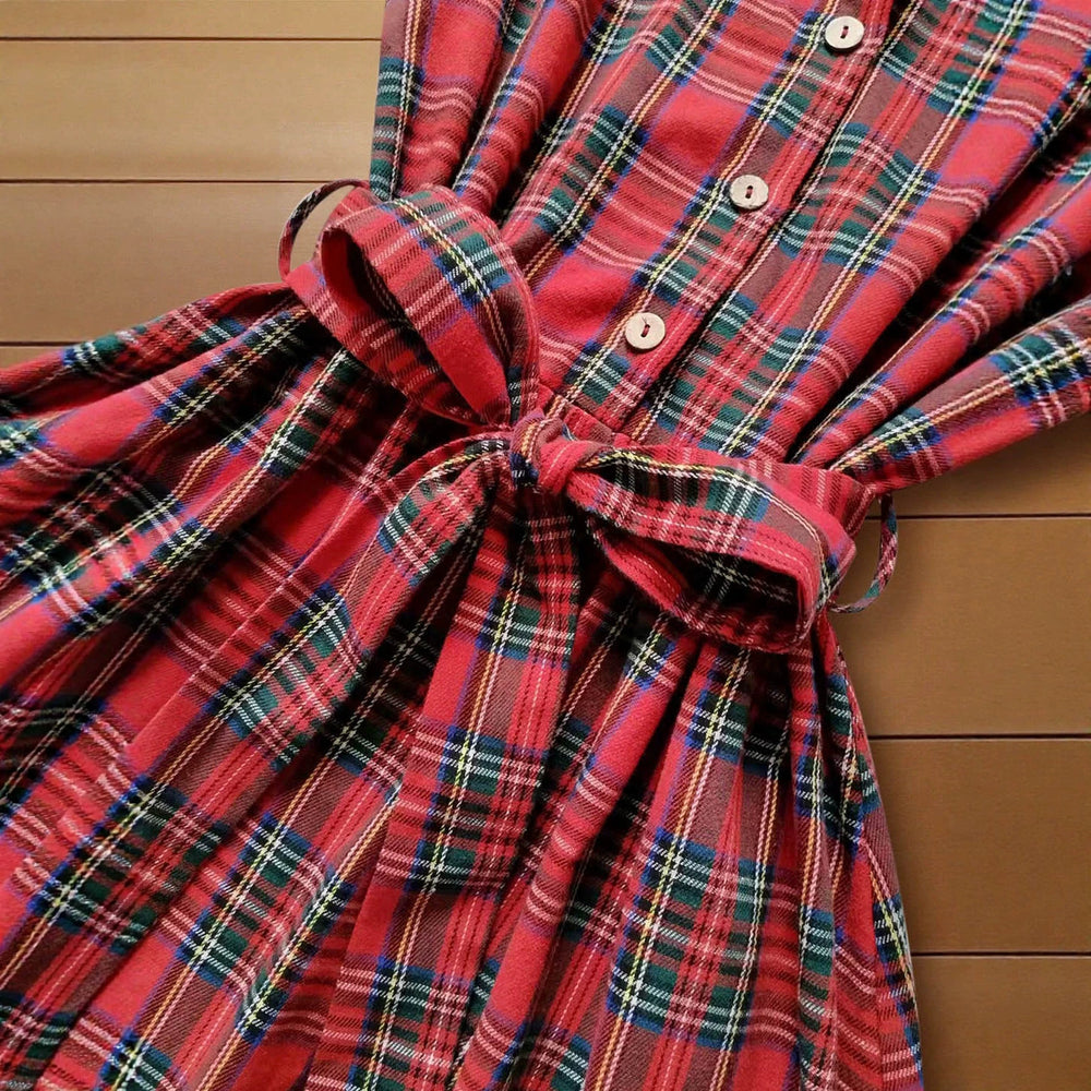 Vintage plaid shirt dress with turn-down collar, belted waist, a-line skirt, and roll-up cuffs