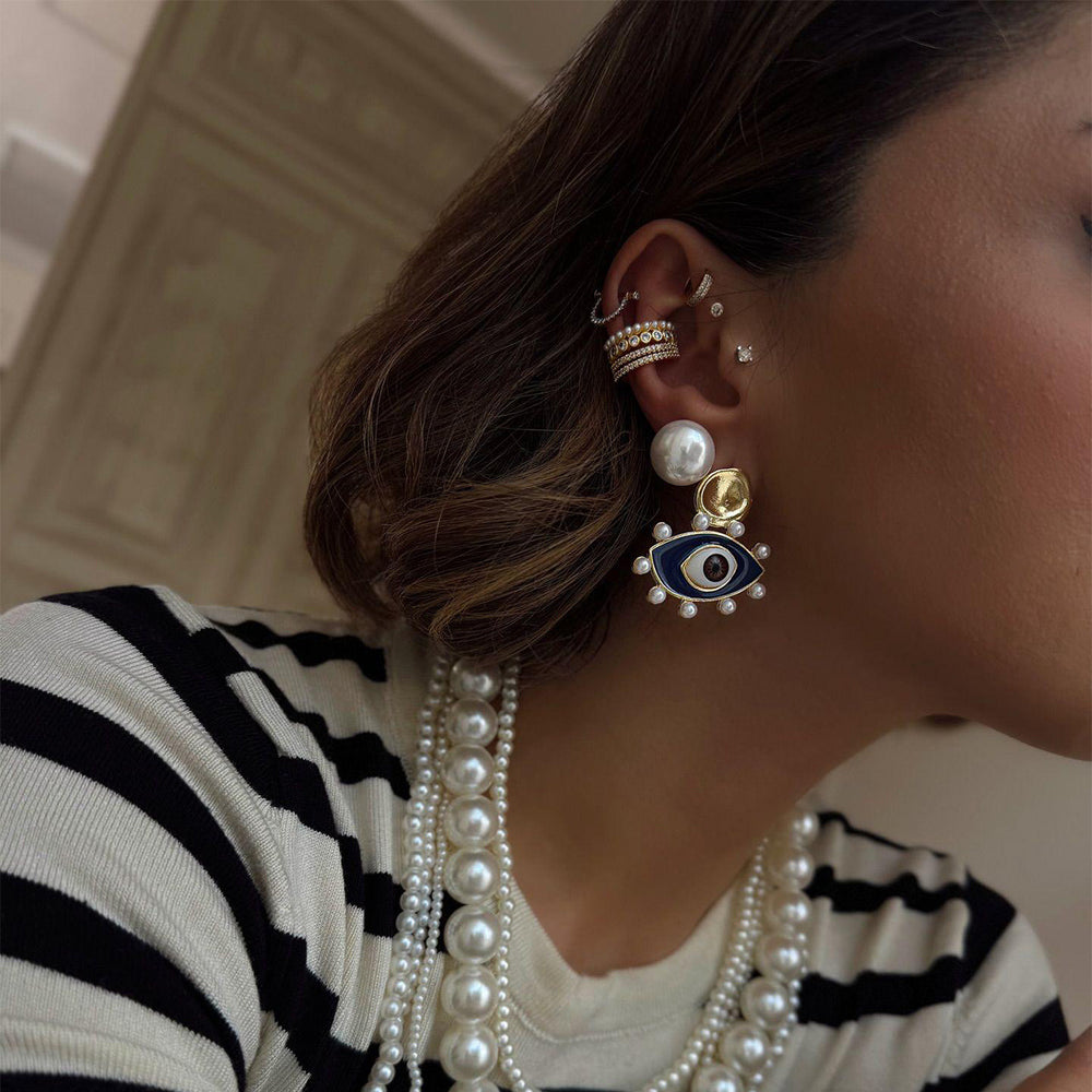 Wholesale devil's eye earrings - european & american style, chic, unique, high-end, statement pearl studs & earrings for women