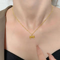 Fresh and sweet "runaway princess" bowknot 18k gold-plated titanium steel necklace - women's luxury design clavicle chain wholesale