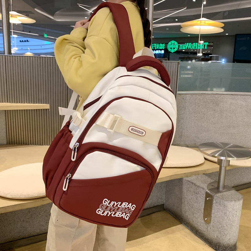 Backpack New fashion junior high school college student schoolbag Large capacity lightweight backpack Simple texture backpack