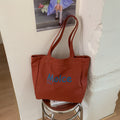 2026 hot-selling women's large capacity practical tote bag - student school bag with letter print canvas/oxford cloth