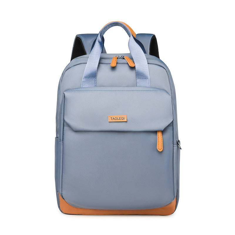 New large-capacity simple travel backpack, lightweight and trendy college student schoolbag, fashionable business commuter backpack.
