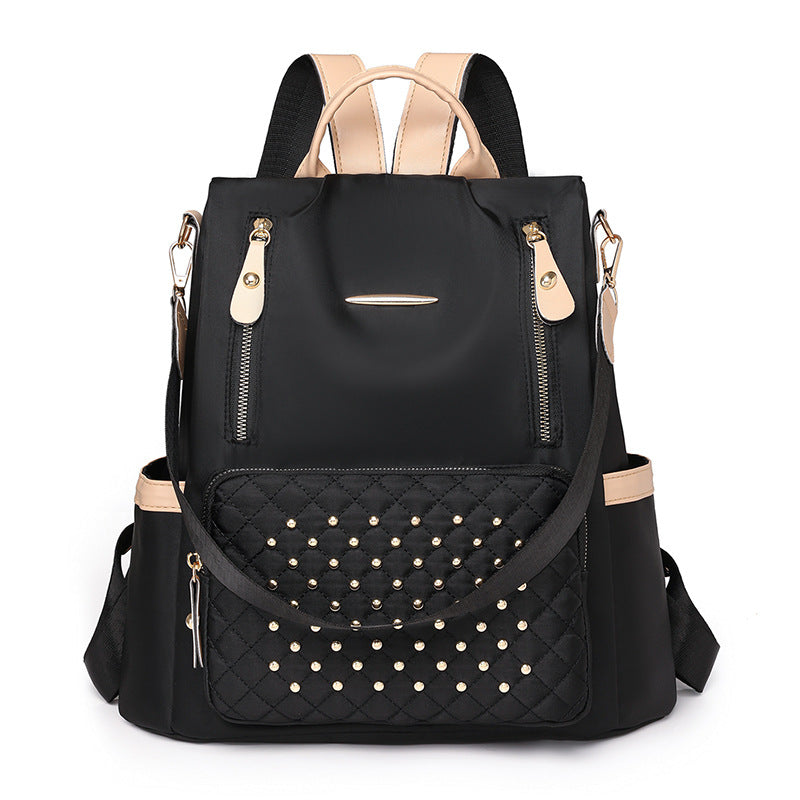 Rhombus student schoolbag large capacity fashion simple casual versatile backpack rivet inlaid women's backpack wholesale
