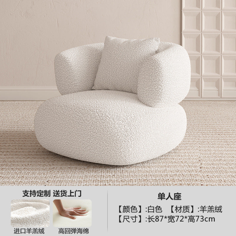 Cream nordic sofa, irregular shape, suitable for small living rooms, modern minimalist style, ideal for beauty salons and rest areas, perfect for compact spaces