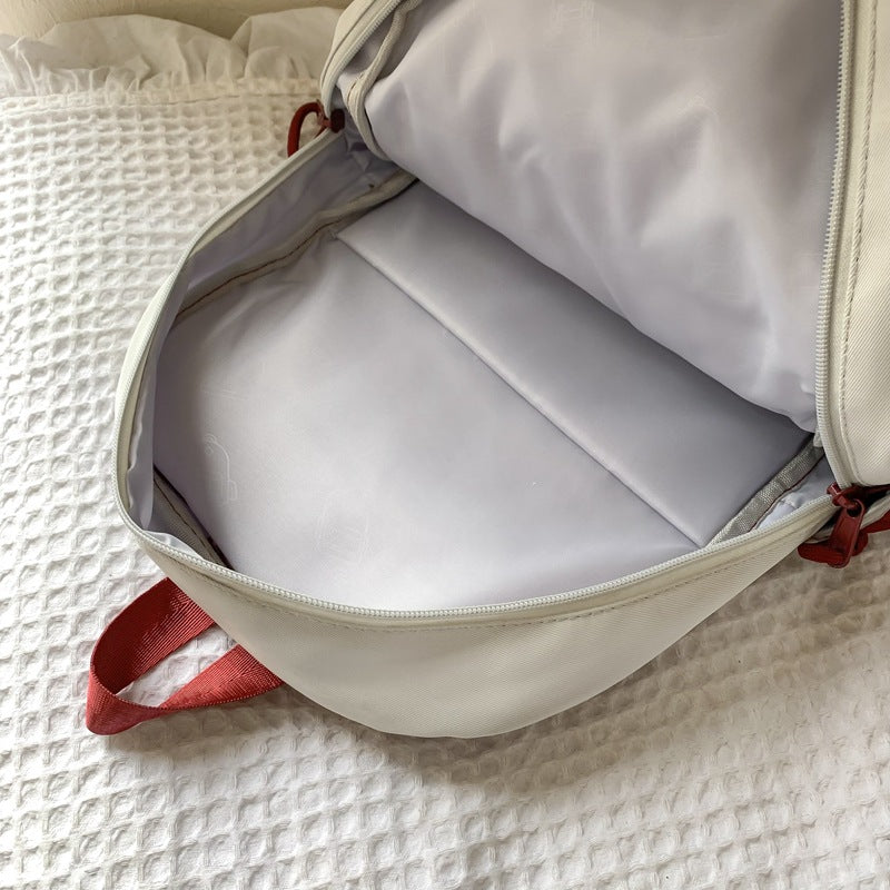 New Korean version contrasting color trend student schoolbag fashionable leisure commuting backpack large capacity versatile travel backpack