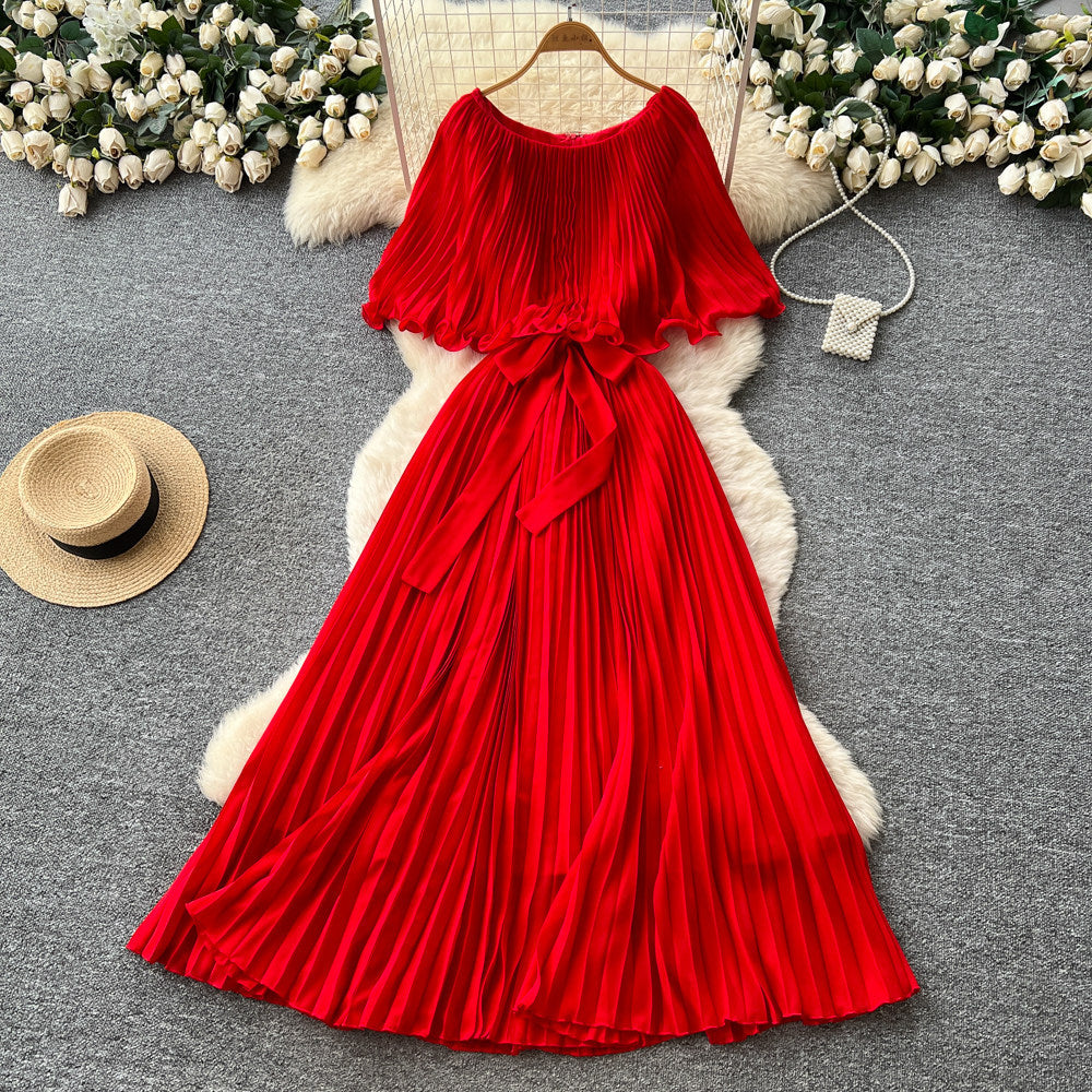 French-inspired pleated dress for women, featuring a bow tie, off-the-shoulder design, tie-waist, and flattering pleats for an elegant and sophisticated look