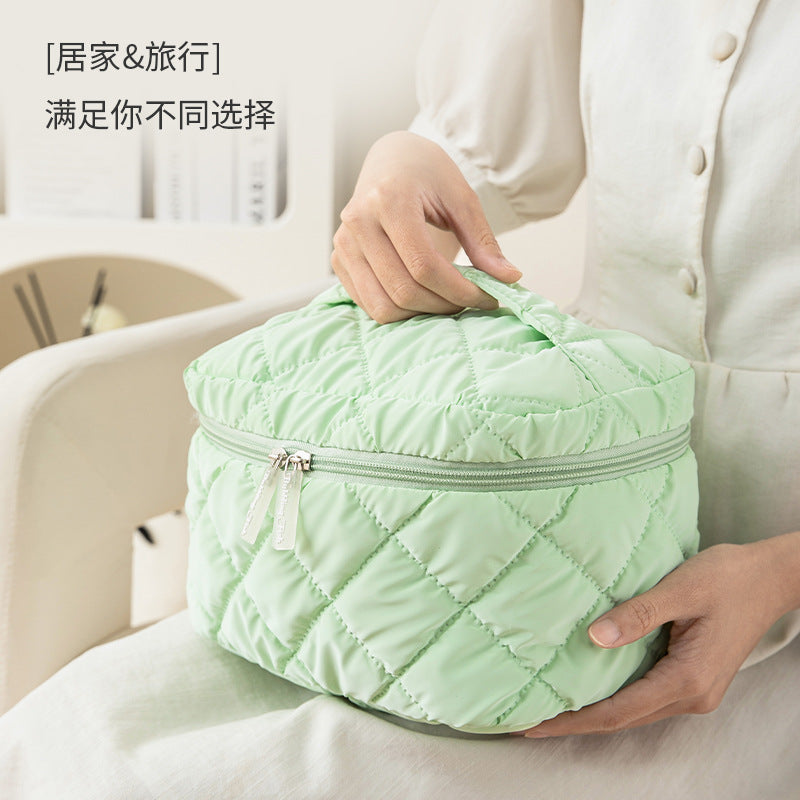 Yulang new down portable cosmetic bag large capacity portable storage bag waterproof high value travel toilet bag