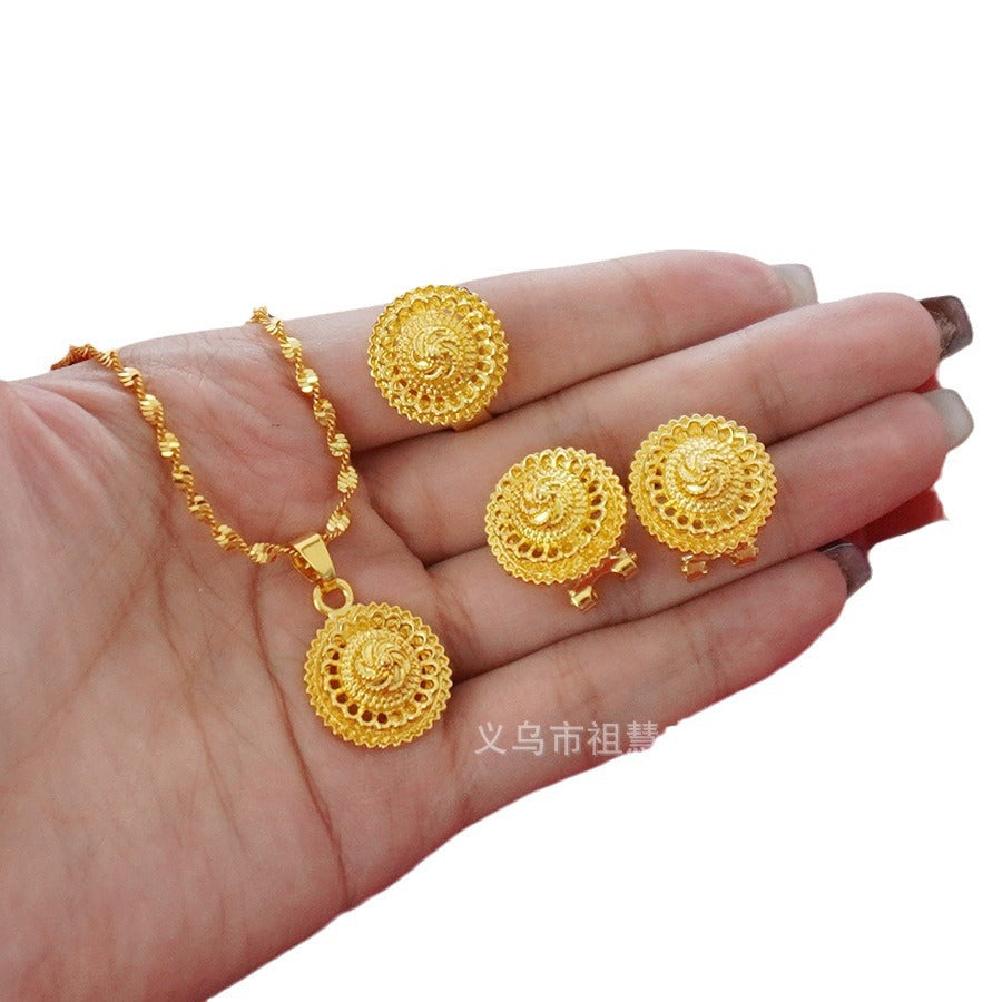Wholesale cross-border middle eastern rotating floral design gold plated necklace pendant earrings ring three-piece jewelry set