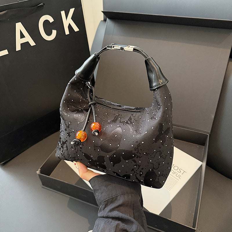 New Chinese style national style portable small bag women's 2025 summer new bento bag design sense personalized commuter messenger bag