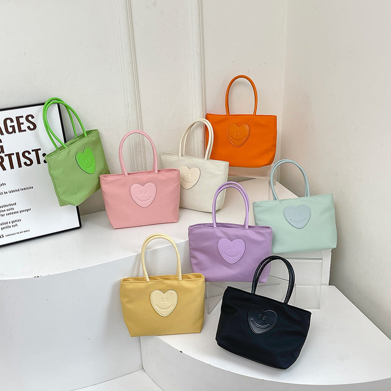 2025 Japanese simple nylon bag mini work small bag cute environmental protection bag student handbag practical mobile phone