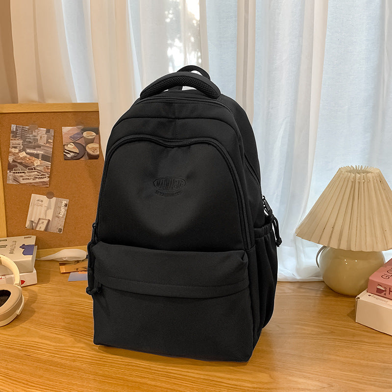 New schoolbag large capacity water-resistant embroidered backpack for junior and senior high school students - solid color, simple, and cute design