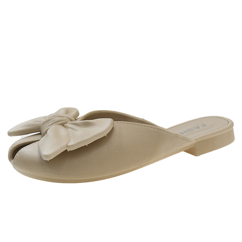 French-style slip-on mules with bow detail, new for summer 2025. unique, fairy-like, flat, retro sandals