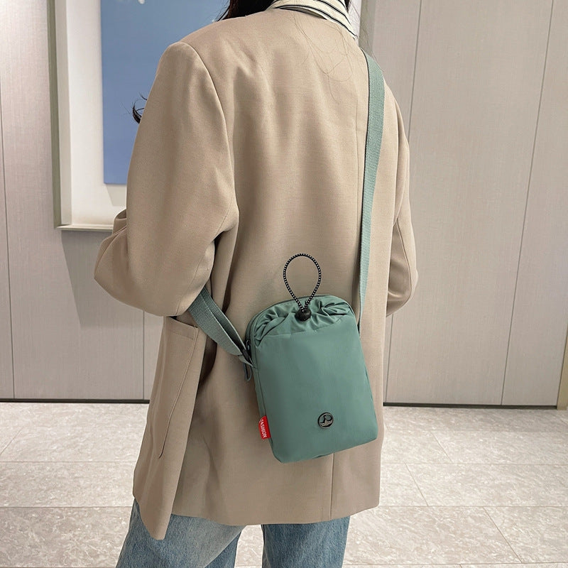 New messenger bag, multi-functional mobile phone bag, waterproof leisure shoulder bag, kettle bag, sports fitness women's bag, water cup bag.