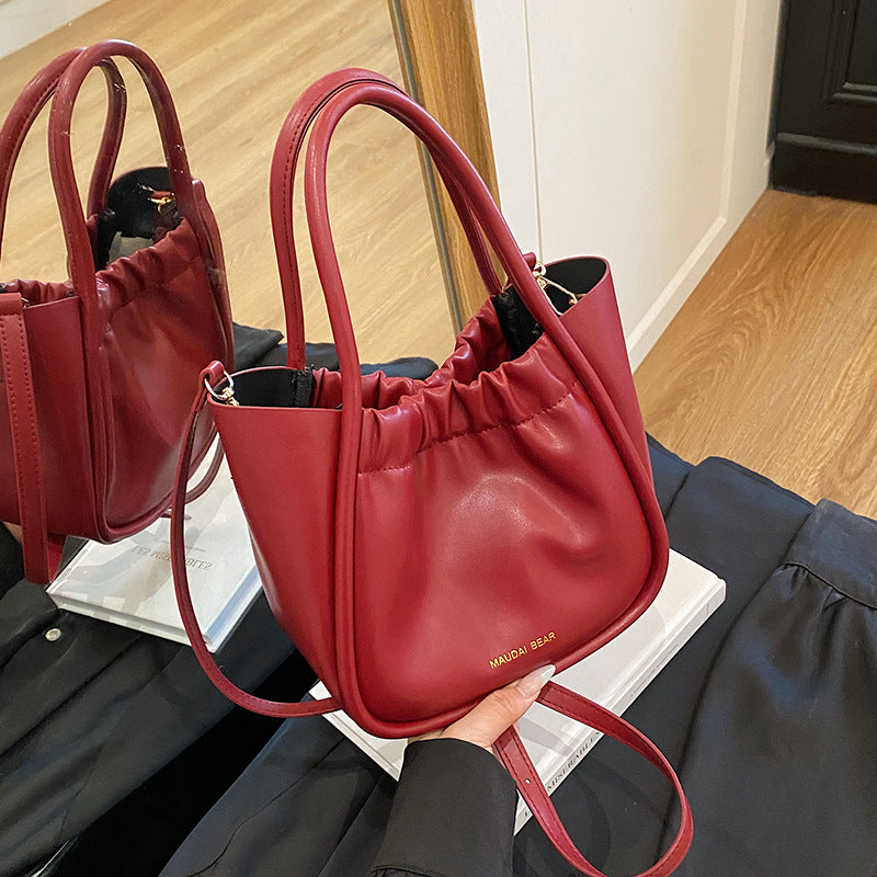 Foreign order high-quality texture foreign gas bucket bag women's 2025 summer new fashion commuter shoulder portable messenger bag