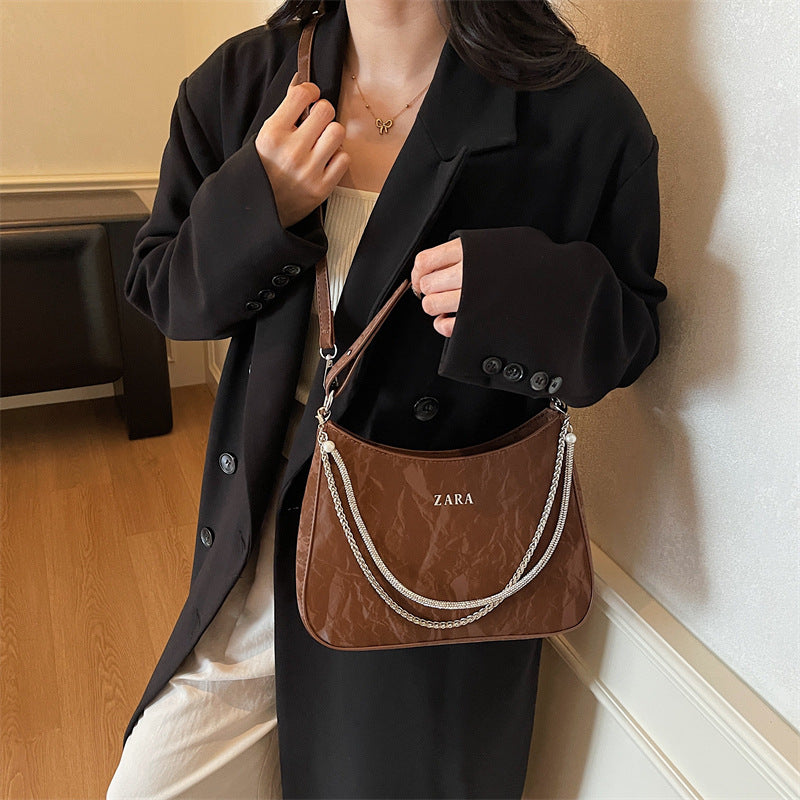 High-end women's bag, large capacity, 2025 new style, niche design, shoulder bag, crossbody bag, understated luxury, textured, commuter tote bag