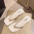 White pearl/flip flops