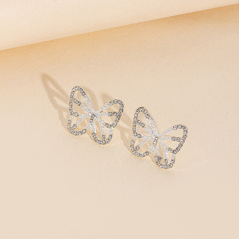 Wholesale butterfly earrings: european & american cross-border fashion jewelry for women - diamond-accented, versatile, unique alloy earrings with a sophisticated, niche appeal
