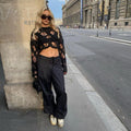 spring/summer new arrivals: european and american style women's fashion - sexy cutout top, trendy cropped knit sweater