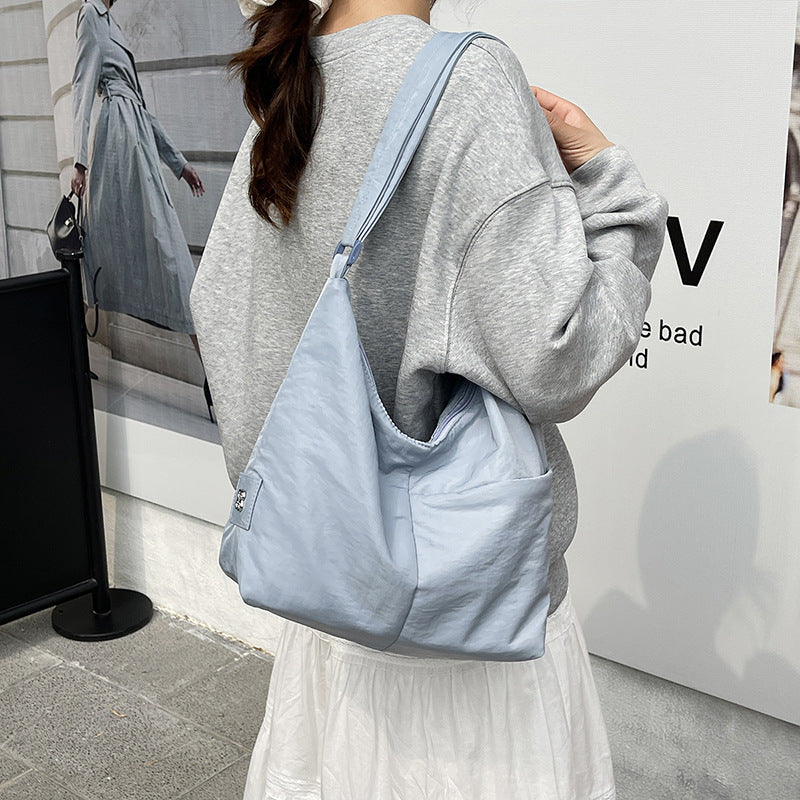 Foreign single nylon cloth bag women's large capacity 2025 new summer leisure niche shoulder messenger bag commuter dumpling bag