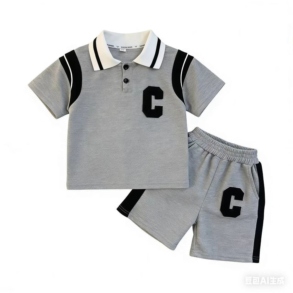 Boys' summer outfit: polo shirt with lettering (short sleeve) + shorts two-piece set - trendy sportswear for boys - wholesale