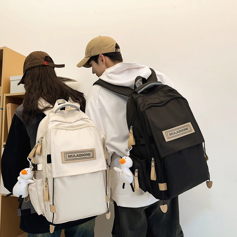 New large-capacity backpack, male and female college students with the same schoolbag, junior high school high school students travel business computer backpack