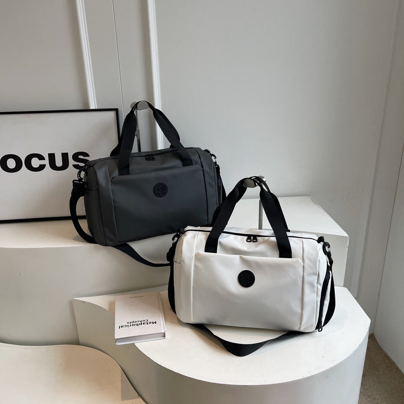 Short-distance large-capacity fashion travel bag, portable shoulder fitness bag, outdoor leisure, short-distance light hand-held training bag