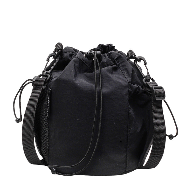 New drawstring bundle hand carry bucket bag  simple casual versatile shoulder bag outdoor commuter messenger women's bag