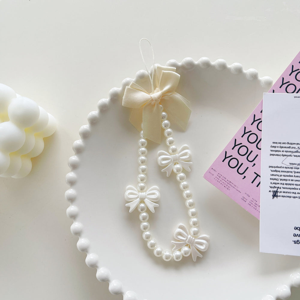 Minimalist pearl white heart bracelet with gauze bow and bear charm - phone lanyard accessory