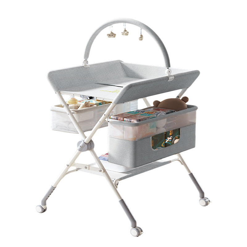 Baby changing table - newborn diaper changing, bathing, and massage station - foldable multifunctional baby bed