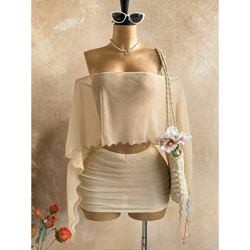 Women's summer sexy vacation see-through asymmetrical one-shoulder long sleeve top with solid color midi skirt (accessories not included)
