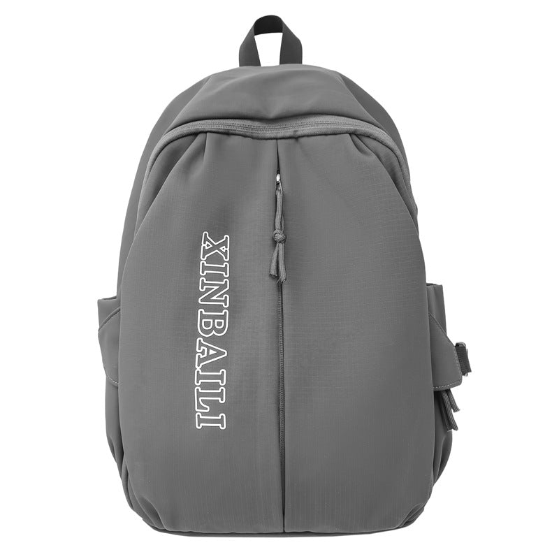Outdoor schoolbag male large capacity junior high school student middle school student fashion trend simple backpack female style travel bag