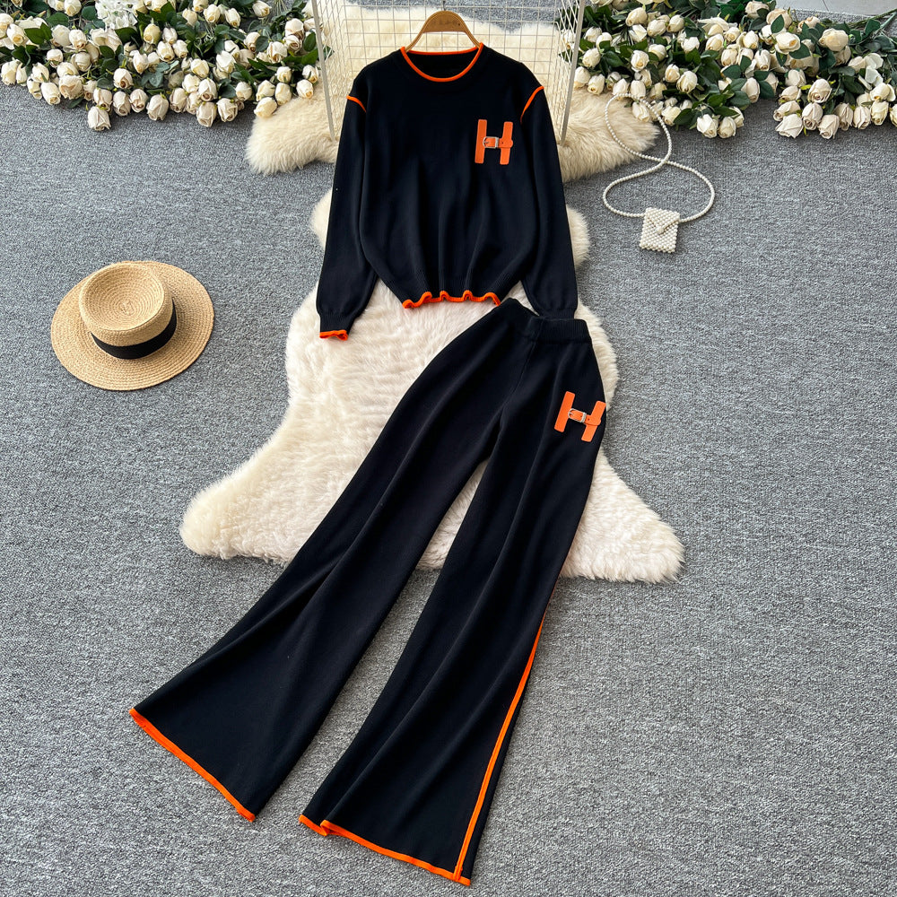 European and american style women's autumn outfit: chic, loose-fit, casual letter embroidered long-sleeve knit top with high-waisted wide-leg pants