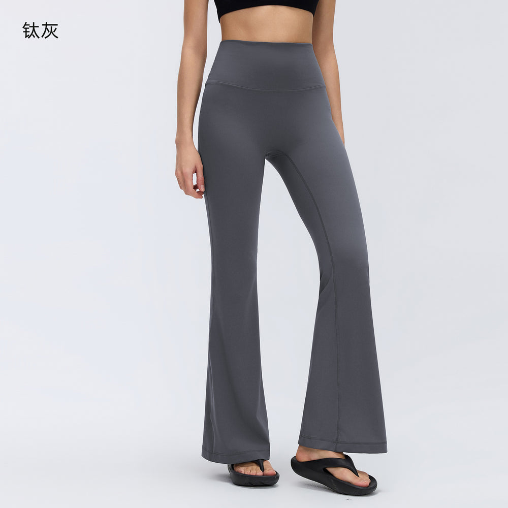 High-waisted, slightly flared yoga pants for women, designed to lift the hips, flatten the tummy, and create a slimming silhouette. these stretchy, barely-there feel leggings are perfect for pilates and other fitness activities. style d26017